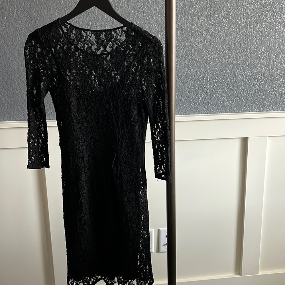 Lace overlay dress with black slip